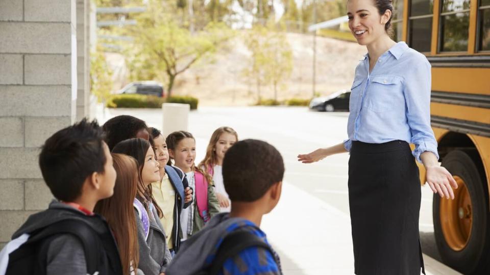 principal with kids