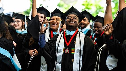 Waving graduates